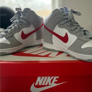 Nike Grey and White High-Top Sneakers with Red Swoosh